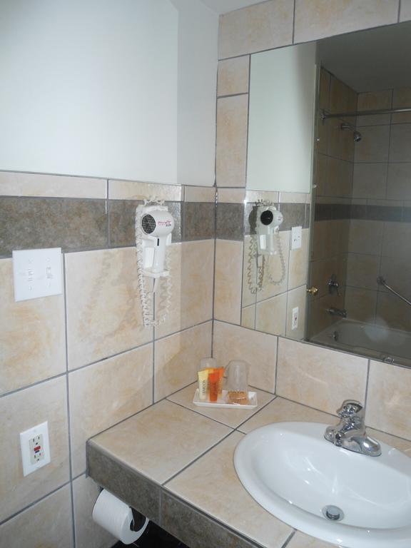 Motel Le Refuge Шербрук Экстерьер фото